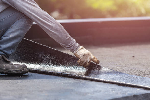 Professional Basement Waterproofing technician working in Woodburn, OR